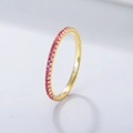 Detailed close-up of 925 sterling silver gold ring with inlaid pink zircon stones - US 5 / Pink (Red Corundum)