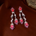 Close-up of elegant silver drop earrings with pink oval gems and sparkling rhinestones - 30# Silver Pin - Silver Pink Oval Long Style