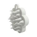 White paw-shaped silicone scalp massager brush with soft cone-shaped massage bristles - White