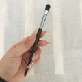 Single tapered eye makeup brush with black wooden handle and dense dark brown bristles - Concealer Brush