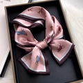 Pink silk scarf with horse print in a luxury gift box on white plush background - Roaming Horse - Peach Pink