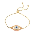Verstelbare gouden boze oog armband met roze emaille en kristallen op witte achtergrond - Roze Blauw Color-blocked Boze Oog Stijl (S130-5)