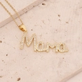 Macro detail of 18K gold plated Mama pendant necklace with inlaid zircon crystals - Mama Letter Clear Zirconia Style (6#)