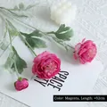 Deep red artificial Ranunculus with three heads and flocked stem on white textile background - Purplish Red