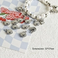 Dettaglio del ciondolo sole sorridente argento Y2K per gioielli fai da te 13x17mm - Stile 01 Sole