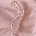 Baroque freshwater pearl necklace with golden smiley face pendant on pink silk - Smiley Face - Cat Eye