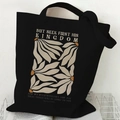 Black canvas tote bag with white floral print and Matthew 6:33 biblical scripture - Matthew 6:33 Biblical Verse (Black)