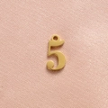 Macro view of gold-plated number five pendant with integrated hanging loop and matte finish - Gold Number 5