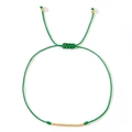 Handmade woven dark green rope bracelet featuring small golden cylindrical beads - Gold Tube Beads / Dark Green