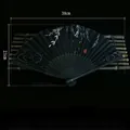 Classic black folding fan with silver willow patterns and elegant black tassel accessory - Ink Dyed West Wind