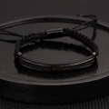 Minimalist black woven bracelet featuring a black metal bar with three rows of micro-pave stones - Black Long Plate
