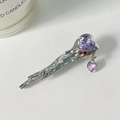 Silver liquid metal bow hair clip featuring purple heart crystals on a white background - Silver Liquid Purple Heart Crystal
