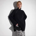 Oversized black turtleneck knit sweater featuring unique side zipper closure for women - S / Black