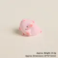 Close-up of cute pink resin pig figurine with 14.3g weight and 29x41x22mm dimensions - Yoga Pink Pig