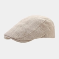 Close-up of beige knitted flat cap showing detailed textured fabric and side stitching - M (56-58cm) / Khaki