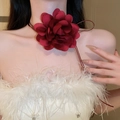 Elegant red fabric floral choker necklace on model with long adjustable ribbon ties - Necklace Style 35