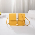 Crossbody square bag in bright yellow and cream with pearl pendant and golden hardware - Yellow