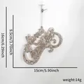 Glittery gold Merry Christmas hanging ornament with detailed size and weight measurements - Silver Brown