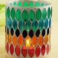 Colorful mosaic glass candle holder with almond-shaped tiles and warm glowing candle inside - Mixed Color Patch