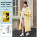 Reusable pale yellow EVA raincoat with hood and elastic cuffs in compact packaging - Light Yellow Adult Drawstring Style [100g 17-mil Frosted Extra Thick]