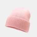 Detail view of pink knit beanie showing thick vertical ribbing and folded cuff texture - One Size / Pink