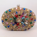 Detail of luxurious clutch bag with colorful gemstones in a sunburst crystal pattern - Iridescent Gold