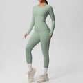 Detail of high-waist sage green yoga leggings with functional side pocket for women - S / Basil Green