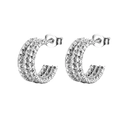 Detailed macro view of silver C-shaped earrings with unique knurled texture finish - 15mm / Silver