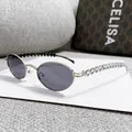 Occhiali da sole ovali in metallo argento con aste con diamanti a cuore e lenti scure - Montatura Argento Lente Grigia