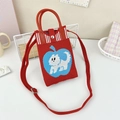 Close-up of red knitted tote bag with blue apple and puppy embroidery detail - 30-Red Dog and Apple