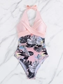Detail of pink halter one-piece swimsuit with bow knot and tropical leaf patterns - S / Pink with Floral Print