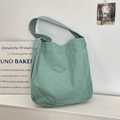 Detail of mint green canvas tote bag with wide shoulder strap for women - Light Cyan