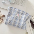 Blue plaid makeup bag detail featuring SOZ ARKA logo and soft cotton-linen woven texture - Dark Blue
