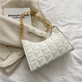 Quilted beige baguette bag with chunky gold chain strap and textured leather finish - White