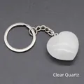 Polished heart-shaped clear quartz keychain with silver metal ring and chain - White Crystal