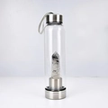 Glass water bottle with natural black rutilated quartz crystal pillar and metal lid - Black Rutilated Quartz Bottle