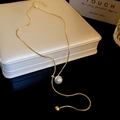 Long gold titanium steel sweater necklace with round pearl pendant on snake chain - Adjustable Pearl Necklace / Gold