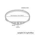 Zilveren roestvrijstalen armband met zirkonia, opengewerkt klaverpatroon en een sluiting - Binnendiameter ca. 6 cm/Breedte 1 cm / Stalkleurige Armband-Z512