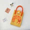 Close-up of ginger yellow knitted phone bag featuring orange cat jacquard and U-shaped handle - Orange Cat-Lucky