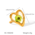 Detail view of heart-shaped gold ring with green dried flower resin inlay on white surface - Heart-Shaped Green Dried Flower Style (HC-R30240)