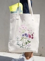 White canvas tote bag featuring delicate watercolor floral prints with pink and purple flowers - Pink Purple Floral