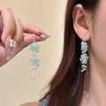 Detail of long tassel earrings with mint green frosted petals and silver chain finish - 10# Pale Green Frosted Flower (Silver Pin)