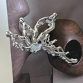 Silver metal hair claw clip with coral branch design and round faux opal inlay - Silver