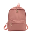 Minimalist pink school backpack with front zipper pocket and side pockets on white background - Pink