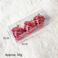 Tre ornamenti natalizi a ghianda rossa con glitter argento in confezione regalo - Pigna Dipinta Rosso Mattone Perlato (50g)