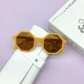 Detail of yellow octagonal kids sunglasses with UV400 lenses and white leather pouch - Octagonal Frame + White Leather Case / Charming Yellow