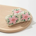 Detailed macro view of a floral crochet hair claw clip with colorful yarn embroidery - Style 5 Pink Granny Square (12.5cm)