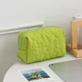 Light green quilted floral cosmetic bag with soft texture and metallic zip closure - Irregular Green Flowers