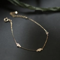 Elegant gold S925 silver heart bracelet with sparkling crystals on a dark background - 925 Silver / 18K Gold