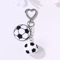 Classic black and white football keychain with a heart-shaped metal clasp and 3D soccer ball - Silver Heart Hook Soccer Dual Charm Style